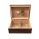 An open humidor with dark mahogany wood exterior showing adjustable divider,gold humidifier and gold hygrometer