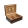 An open humidor with dark mahogany wood exterior and lacquer finish showing adjustable divider,gold humidifier and gold hygrometer