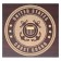Close-up of the US Coast Guard emblem engraved on top of a humidor