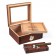 A rosewood glass top humidor with adjustable divider and ashtray with a cigar on top