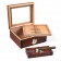 A rosewood glass top humidor with adjustable divider and ashtray with a cigar on top