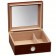 An open small glass humidor  in cherry finish with see through glass on top and an external hygrometer showing the adjustable divider 