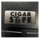 Close-up of the words cigar safe over a grey plaque engraved on the lid of a travel humidor 