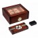 A closed rosewood glass top humidor with external hygrometer, and an ashtray