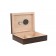 An open ebony wood humidor showing the humidifier, hygrometer and adjustable divider