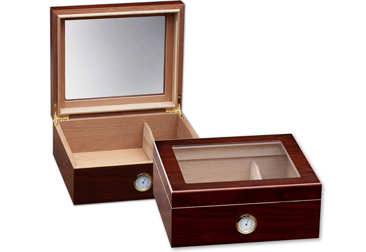 Two small and elegant glass humidors in cherry finish with see through glass on top and an external hygrometer, one humidor is closed and the other one is open