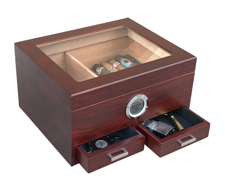 Glass top humidor in cherry finish with an external hygrometer and two drawers open showing accessories inside