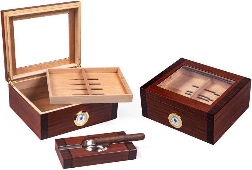 Two rosewood glass top humidors with adjustable divider and ashtray with a cigar on top 