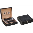 Two humidors with black alligator pattern one is open showing a leather cigar humi-tube and a leather cigar case the other one is closed