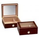Two small and elegant glass humidors in cherry finish with see through glass on top and an external hygrometer, one humidor is closed and the other one is open