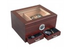 Glass top humidor in cherry finish with an external hygrometer and two drawers open showing accessories inside